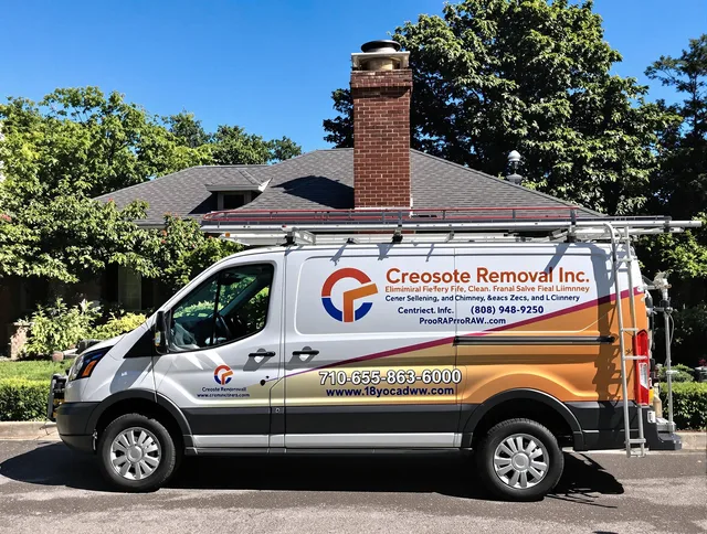 Lakewood Chimney Sweep technician removing creosote safely in Lakewood, OH